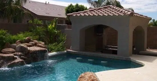 High-quality pool installation with sunken bar by leading pool company in Phoenix