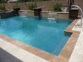 Mesa custom pool remodel with basketball hoop, tile, water fountains and sheer descent feature by True Blue Pools