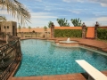 Custom dive pool with attached spa — True Blue Pools (33)