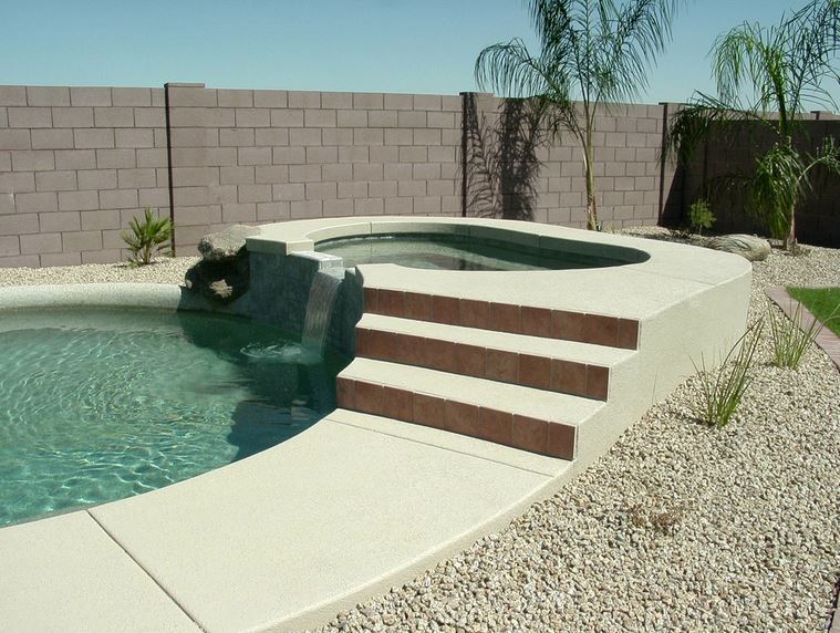 Custom pool remodel added waterfall in Mesa, AZ