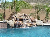 pool building waterfall