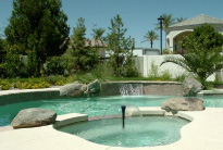 Professionally built swimming pool with integrated spa and waterfall